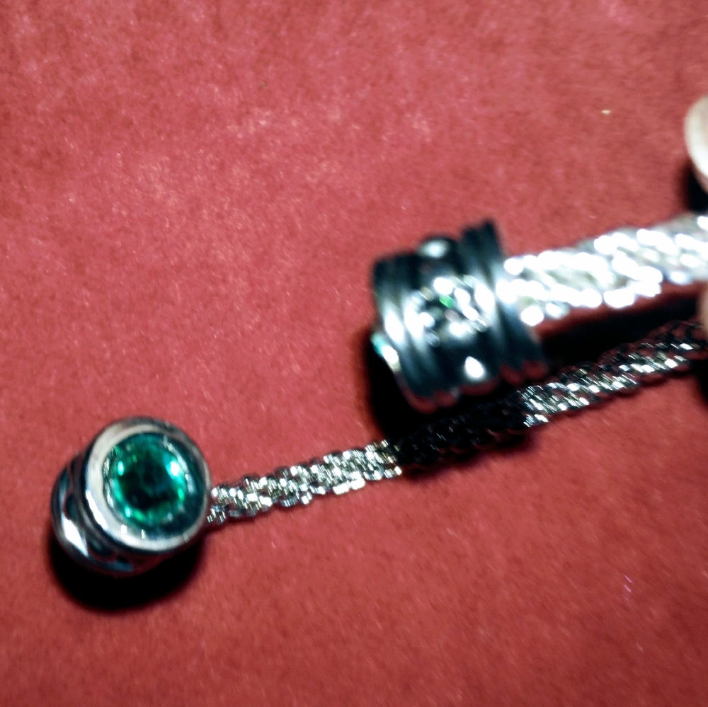 Silver rope beacelet with 2 blue topaz